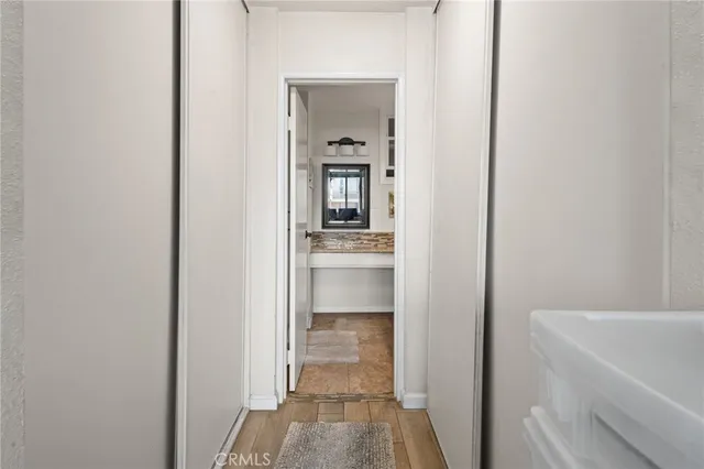 a view of a bedroom from a hallway