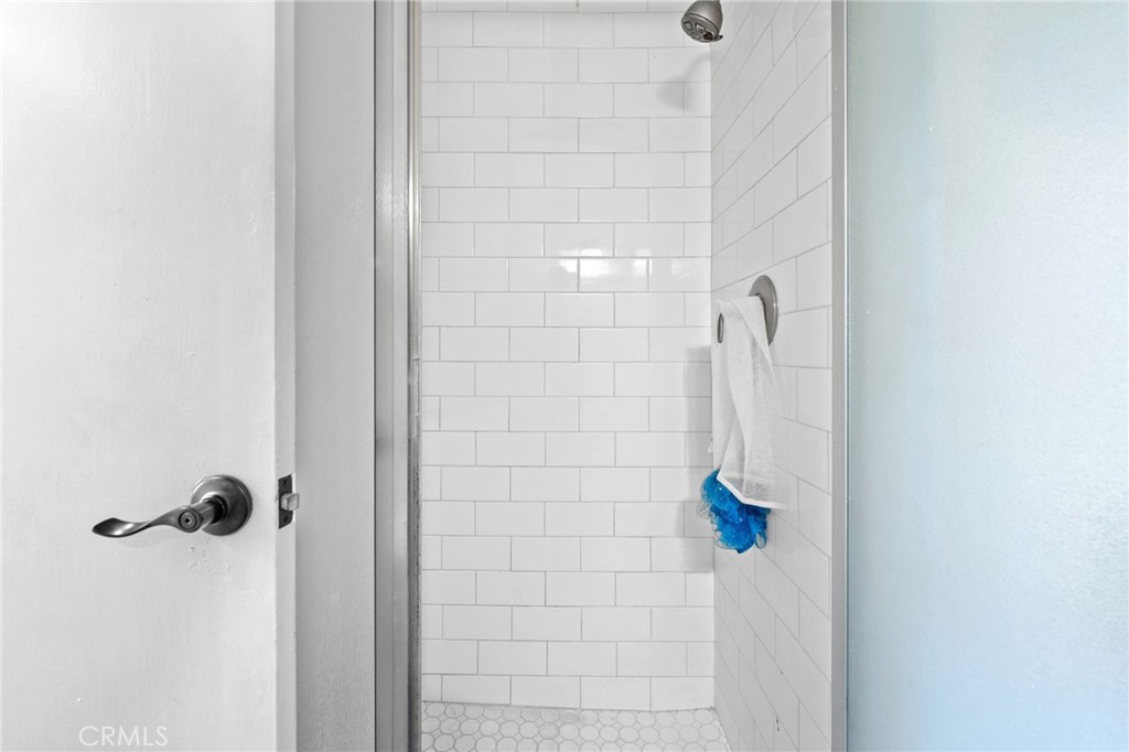 6979 Palm Court Riverside, CA 92506 - Photo 16 of 28 a bathroom with a shower