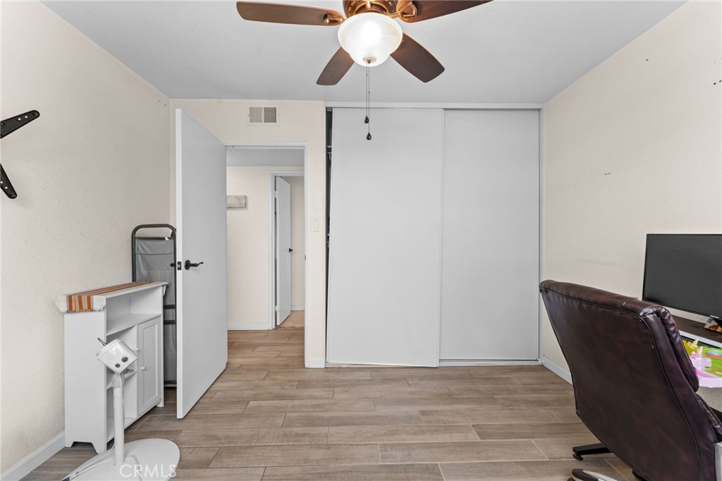 6979 Palm Court Riverside, CA 92506 - Photo 19 of 28 a view of a workspace with furniture and wooden floor