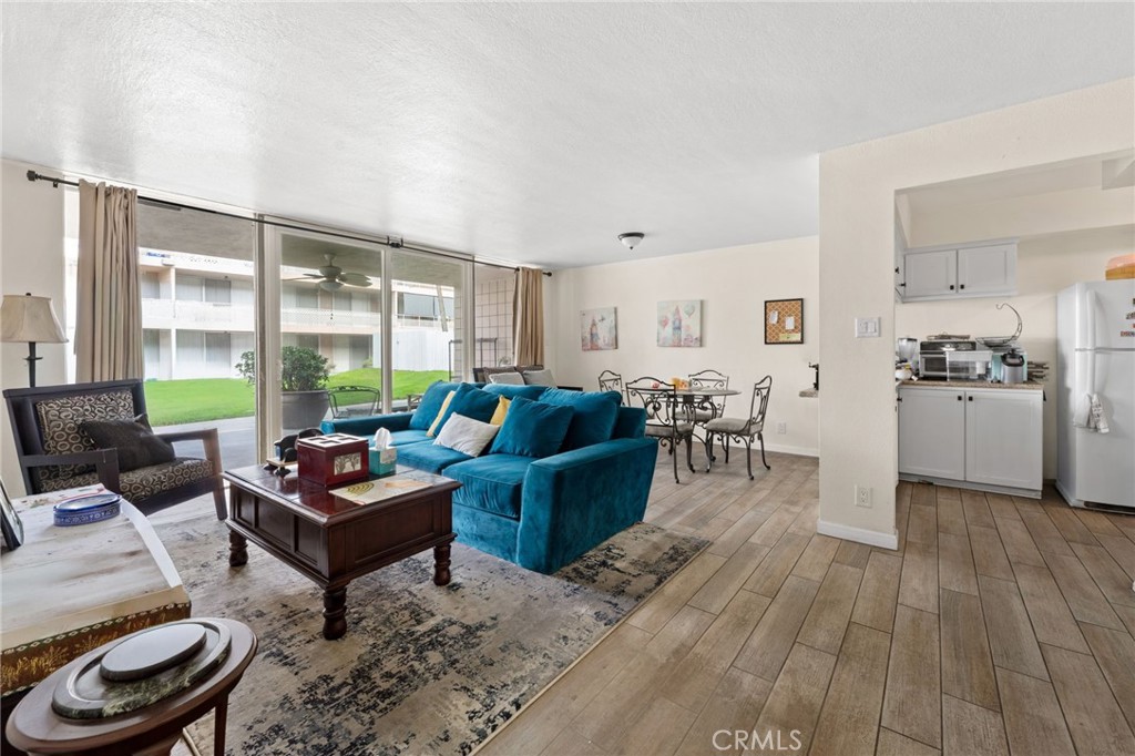 6979 Palm Court Riverside, CA 92506 - Photo 7 of 28 a living room with furniture and a large window