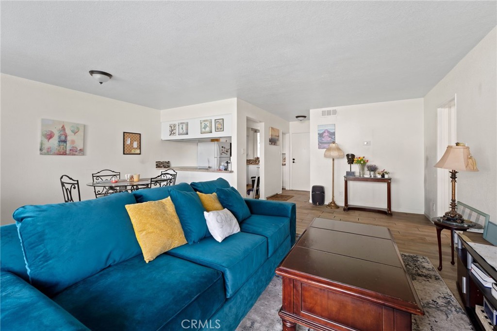 6979 Palm Court Riverside, CA 92506 - Photo 9 of 28 a living room with furniture and a couch