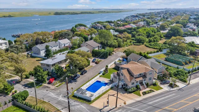 an aerial view of a house with a garden