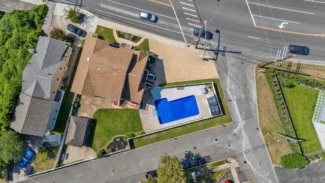 an aerial view of a house with a garden