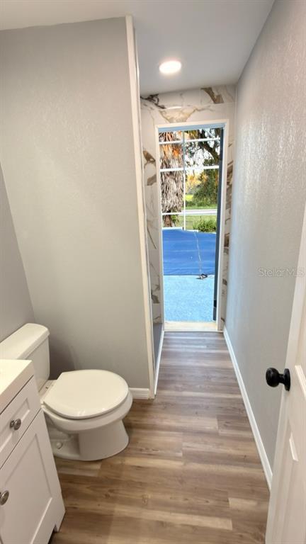 14740 Johns Road Dade City, FL 33525 - Photo 23 of 46 a bathroom with a toilet and a shower