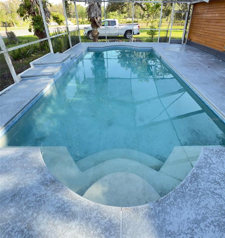 14740 Johns Road Dade City, FL 33525 - Photo 35 of 46 a view of outdoor space and deck