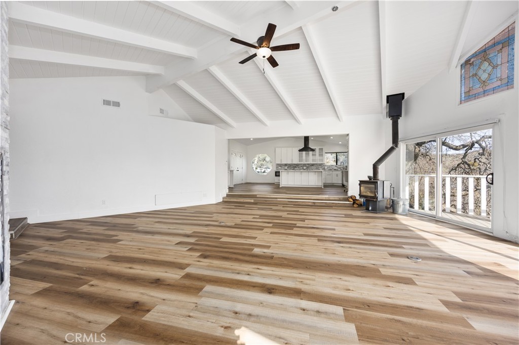 29300 Elkhorn Place Tehachapi, CA 93561 - Photo 12 of 47 a view of empty room with a ceiling fan