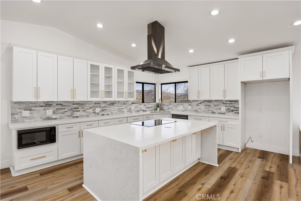 29300 Elkhorn Place Tehachapi, CA 93561 - Photo 13 of 47 a kitchen with stainless steel appliances a sink stove and refrigerator