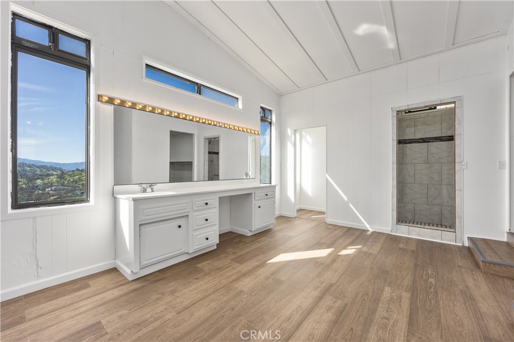 29300 Elkhorn Place Tehachapi, CA 93561 - Photo 19 of 47 a view of room with window and wooden floor