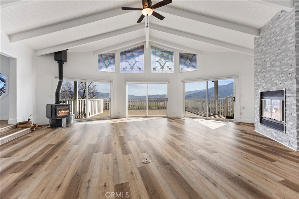 29300 Elkhorn Place Tehachapi, CA 93561 - Photo 10 of 47 wooden floor in an empty room with a window