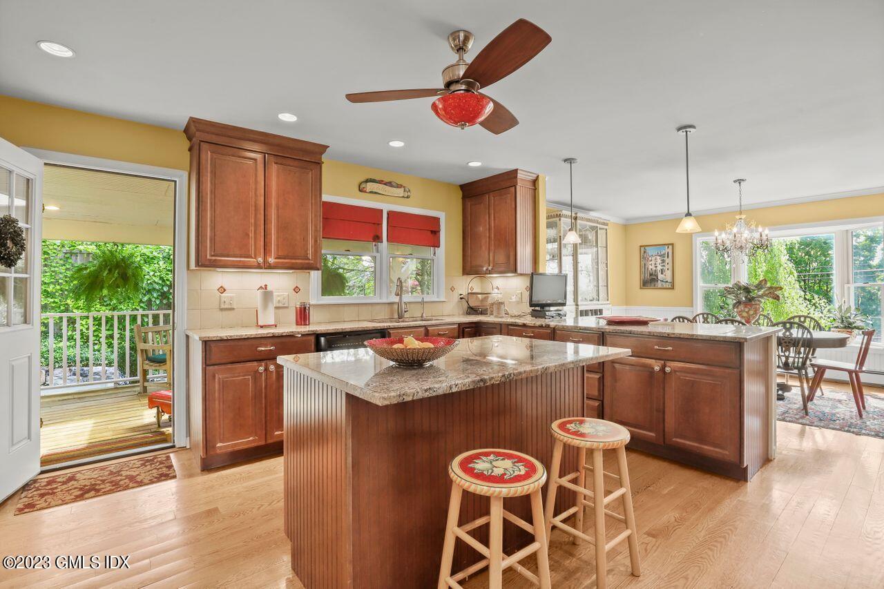 14 Marks Road Riverside, CT 06878 - Photo 10 of 24 a kitchen with a sink a counter top space and stainless steel appliances