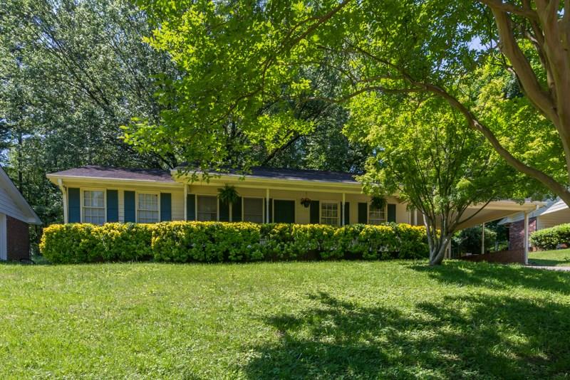 Close in ranch home with large rooms, all hardwood floors, and private back yard. It sits high above the street.  There is covered parking in the large carport for 2 vehicles.