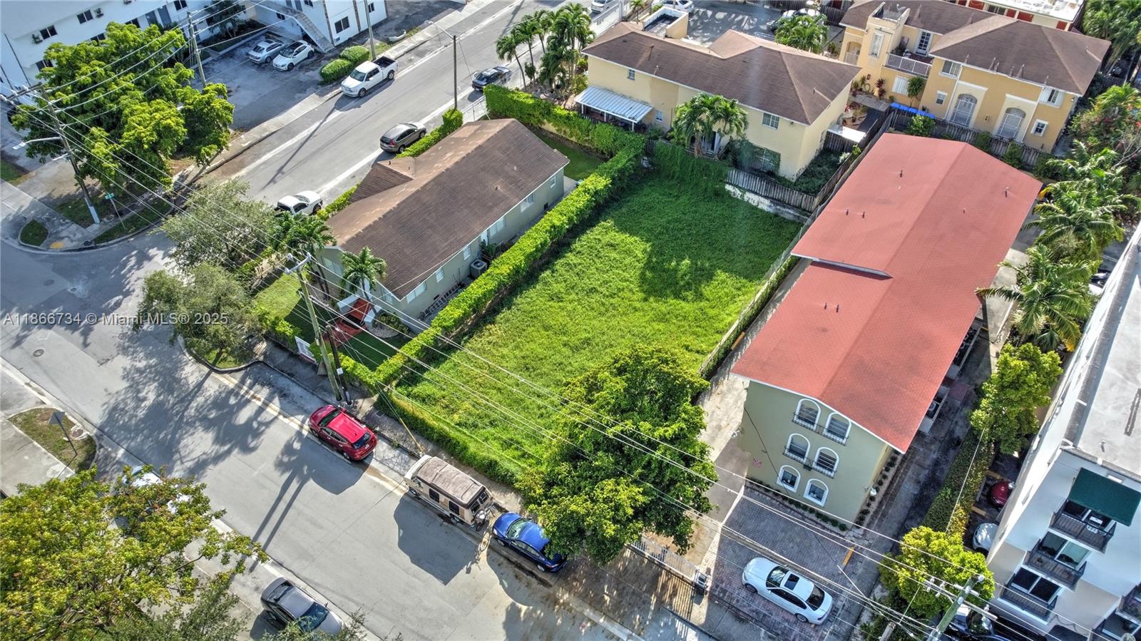 236 Southwest 4th Avenue Miami, FL 33130 - Photo 6 of 8 an aerial view of a house with a yard