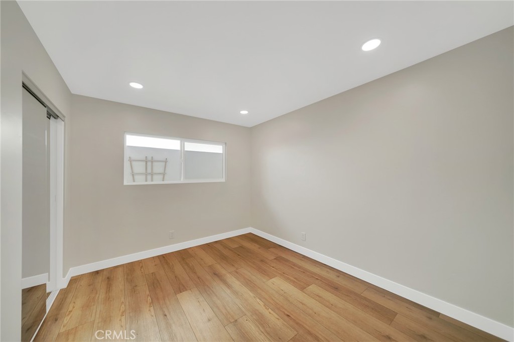 25251 Tuna Drive Dana Point, CA 92629 - Photo 18 of 30 a view of empty room with wooden floor