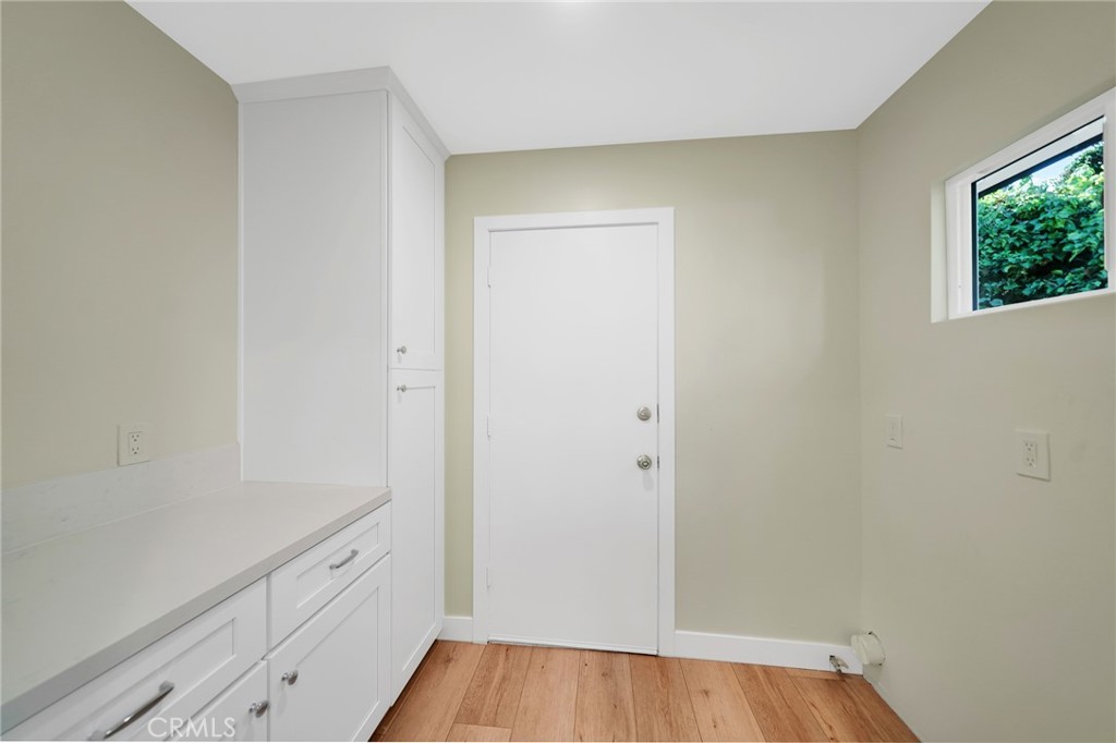 25251 Tuna Drive Dana Point, CA 92629 - Photo 24 of 30 a hallway with wooden floor