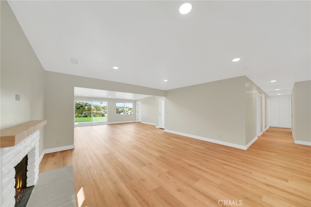 25251 Tuna Drive Dana Point, CA 92629 - Photo 5 of 30 a view of an empty room with wooden floor and a window