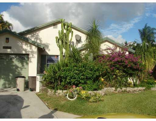 20924 Springs Terrace Boca Raton, FL 33428 - Photo 3 of 14 Exterior Front