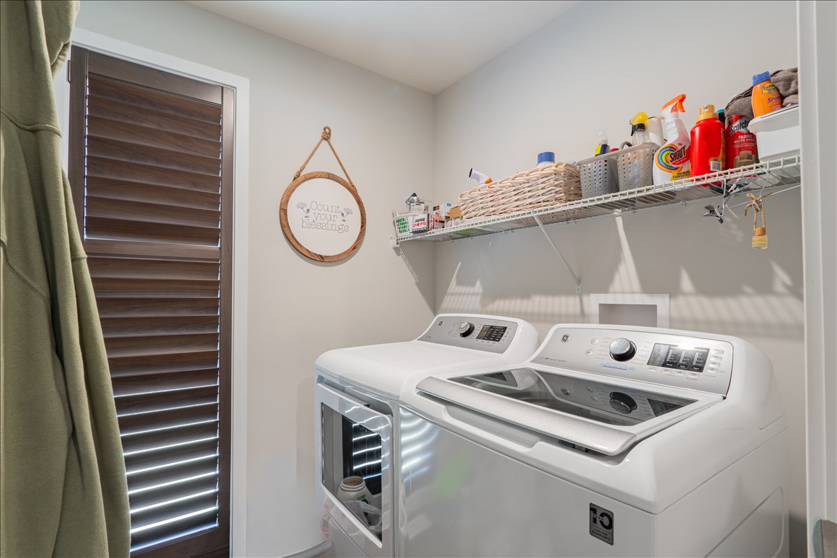2618 Limestone Court Normal, IL 61761 - Photo 16 of 33 a utility room with dryer and washer