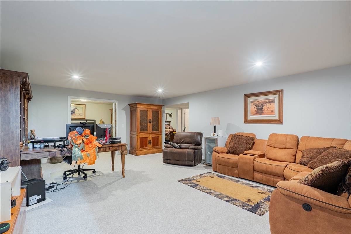 2618 Limestone Court Normal, IL 61761 - Photo 18 of 33 a living room with furniture and a couch