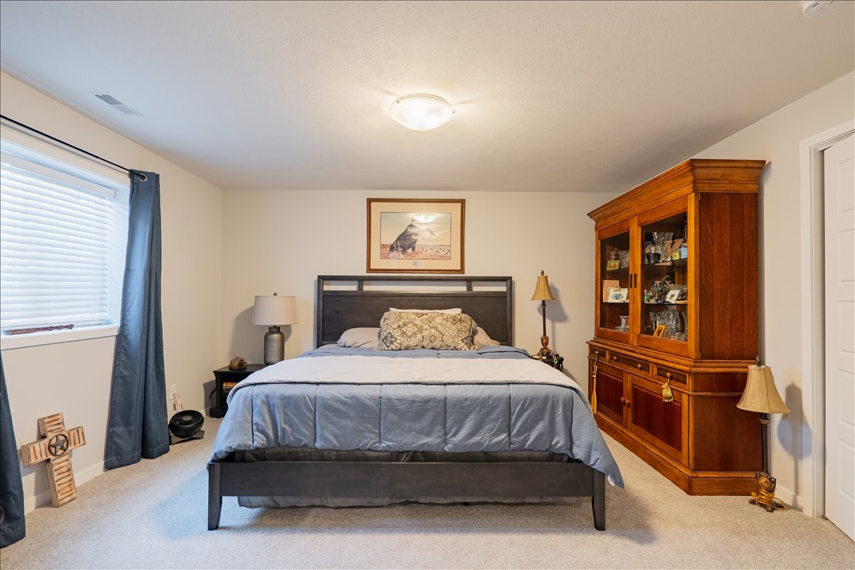 2618 Limestone Court Normal, IL 61761 - Photo 21 of 33 a bedroom with a bed and a window