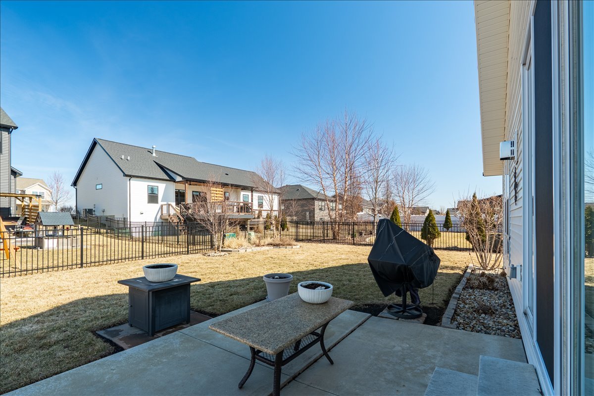 2618 Limestone Court Normal, IL 61761 - Photo 27 of 33 a view of a swimming pool and lounge chairs