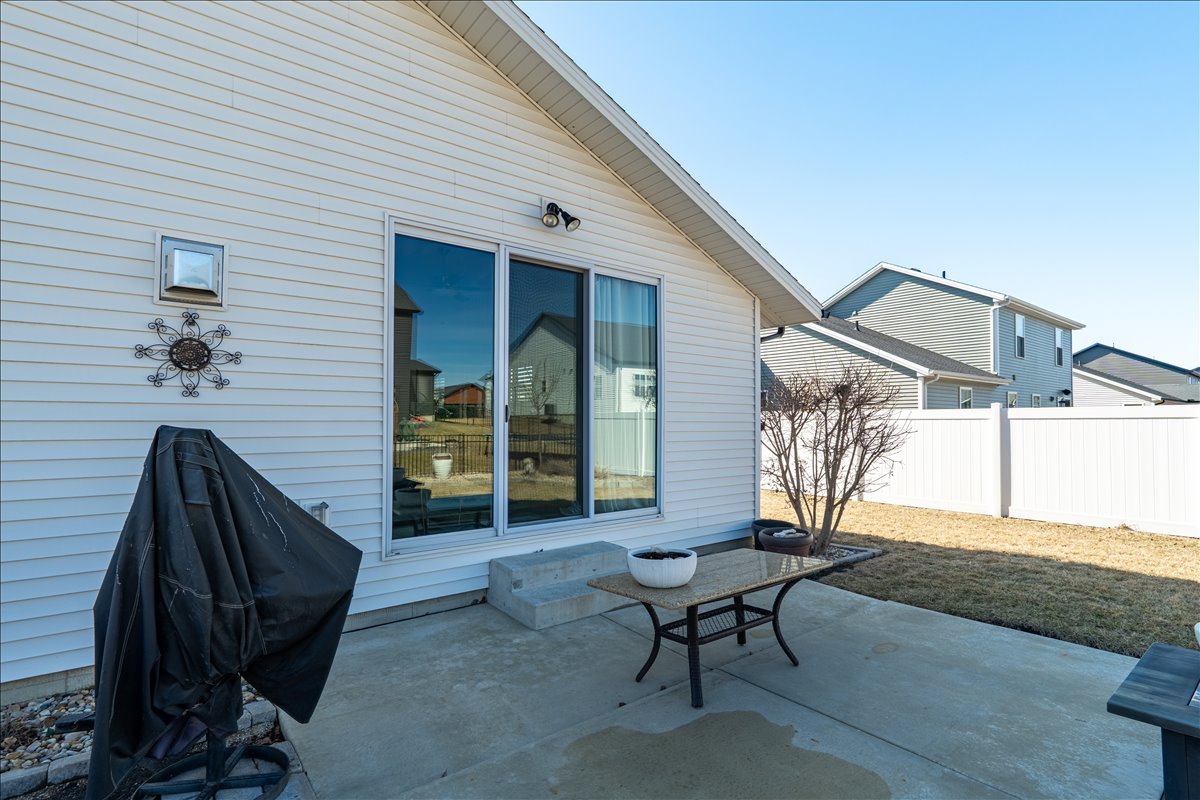 2618 Limestone Court Normal, IL 61761 - Photo 28 of 33 a view of a porch with furniture and a yard