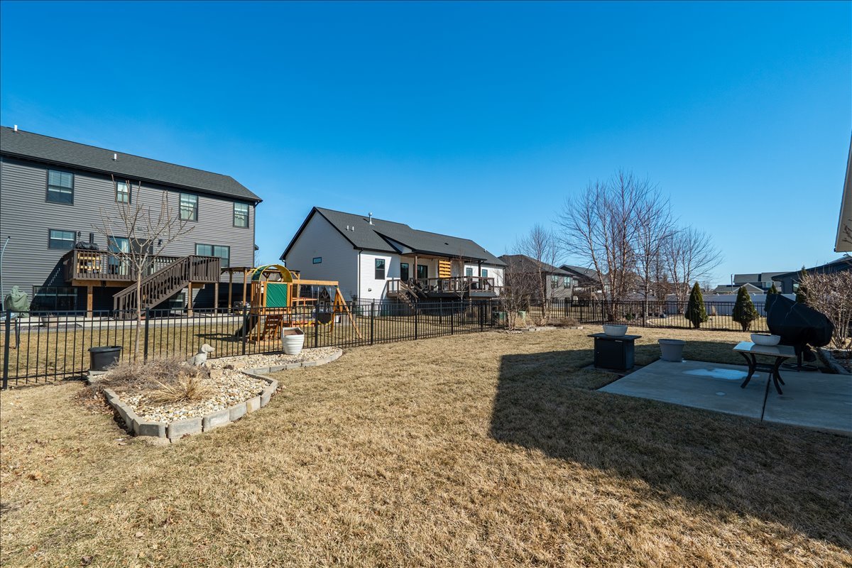 2618 Limestone Court Normal, IL 61761 - Photo 29 of 33 a view of a house with backyard porch and sitting area