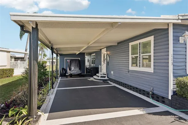 a view of a building with sitting area