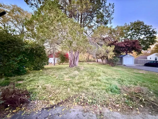 a fire hydrant in the middle of a field