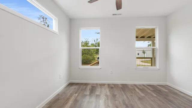 an empty room with windows