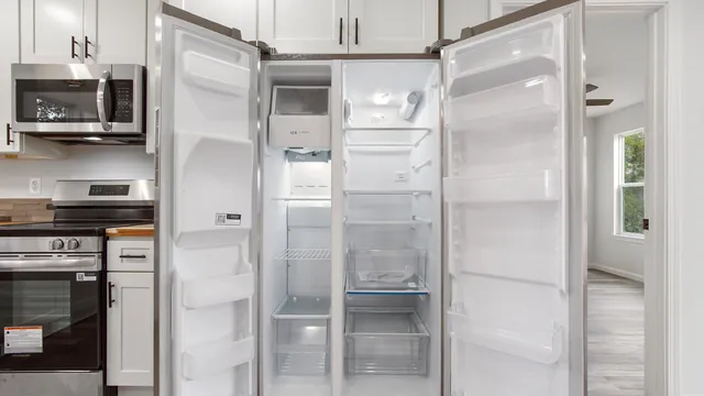 a bathroom with a shower and a mirror