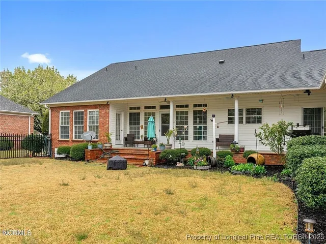 a front view of a house with a patio