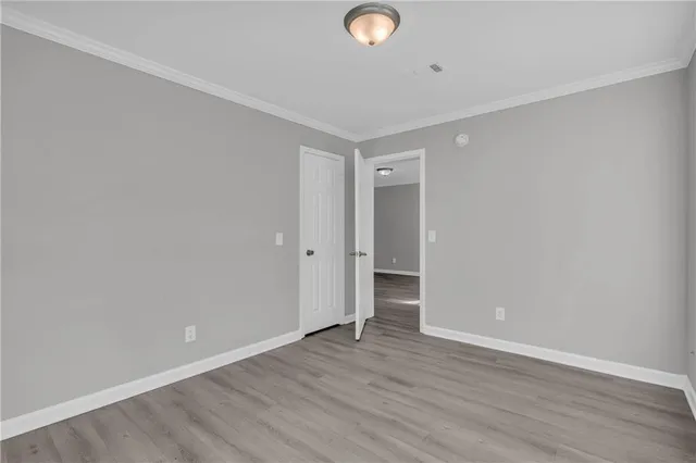 a bathroom with a sink toilet vanity and shower