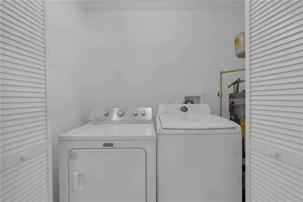 1040 Thomasville Estates Way Southeast Atlanta, GA 30315 - Photo 19 of 28 a utility room with dryer and washer
