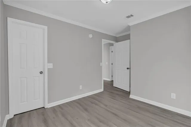 a view of entryway with wooden floor