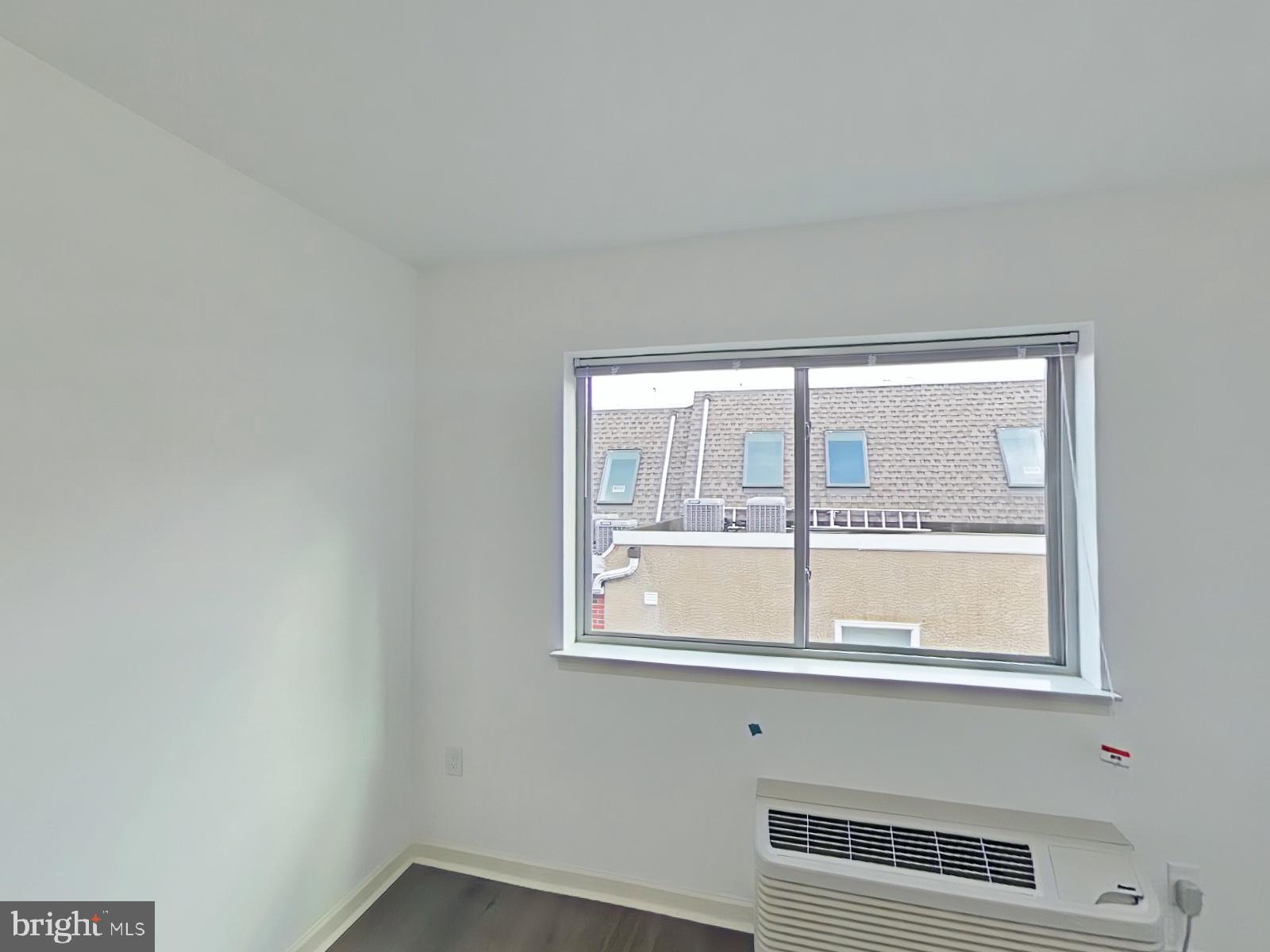 6649 Ridge Avenue, Unit C104 Philadelphia, PA 19128 - Photo 7 of 7 a kitchen with a window