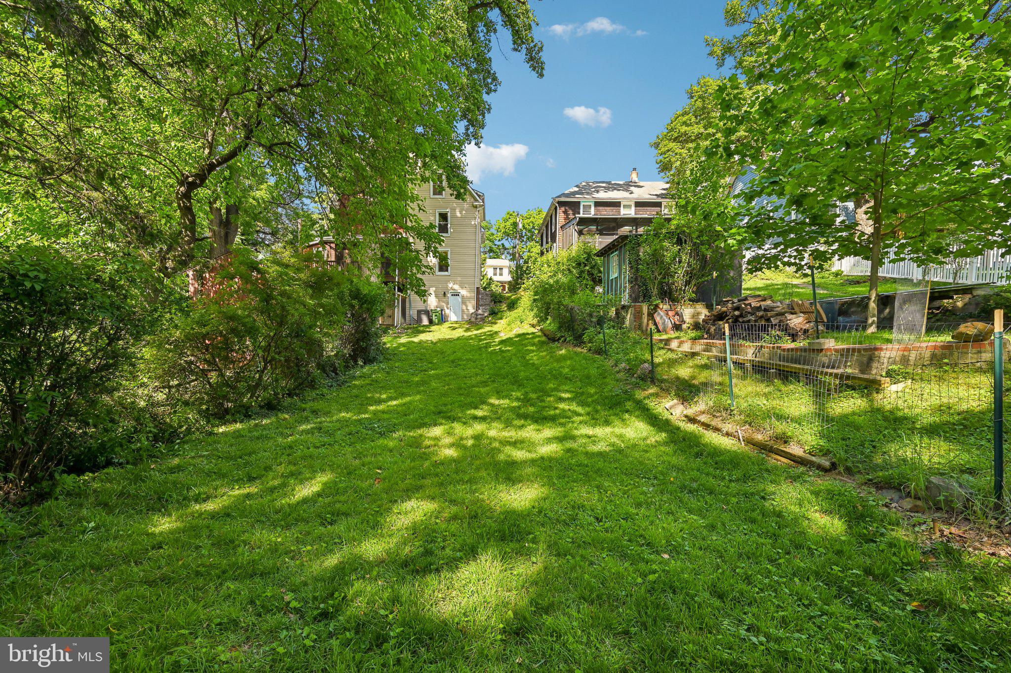 5714 Rusk Avenue Baltimore, MD 21215 - Photo 44 of 51 Lush green space in a serene setting.