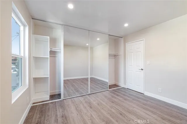 a bathroom with a shower and toilet