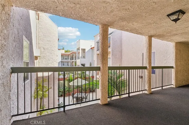 a view of a balcony with stairs