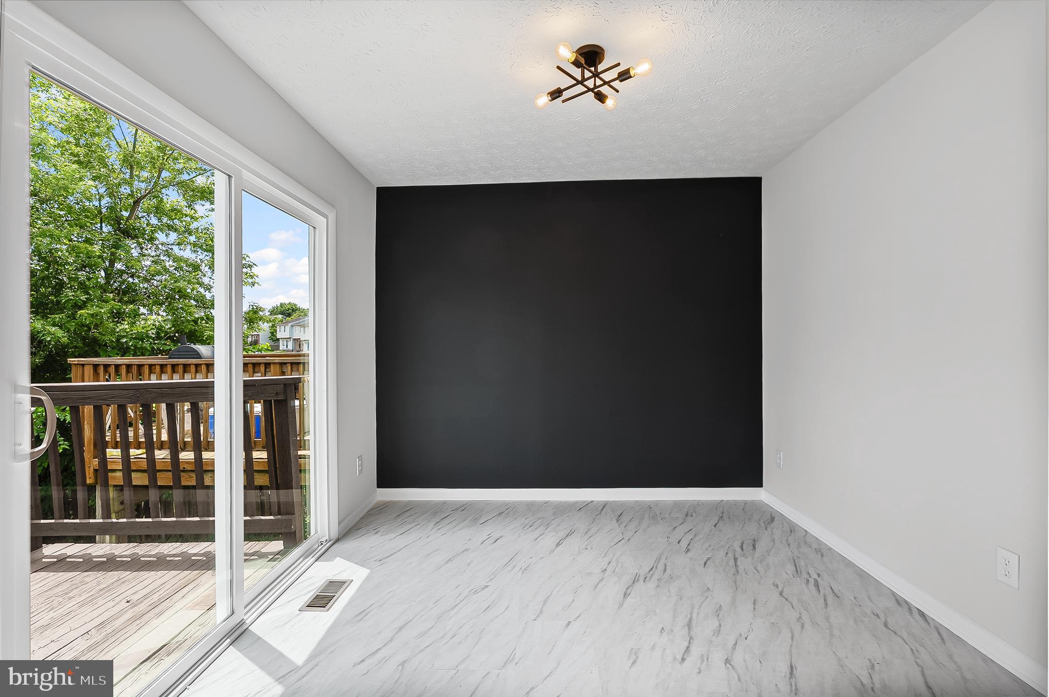 909 Olive Branch Court Edgewood, MD 21040 - Photo 14 of 36 a view of a hallway with wooden floor and a window