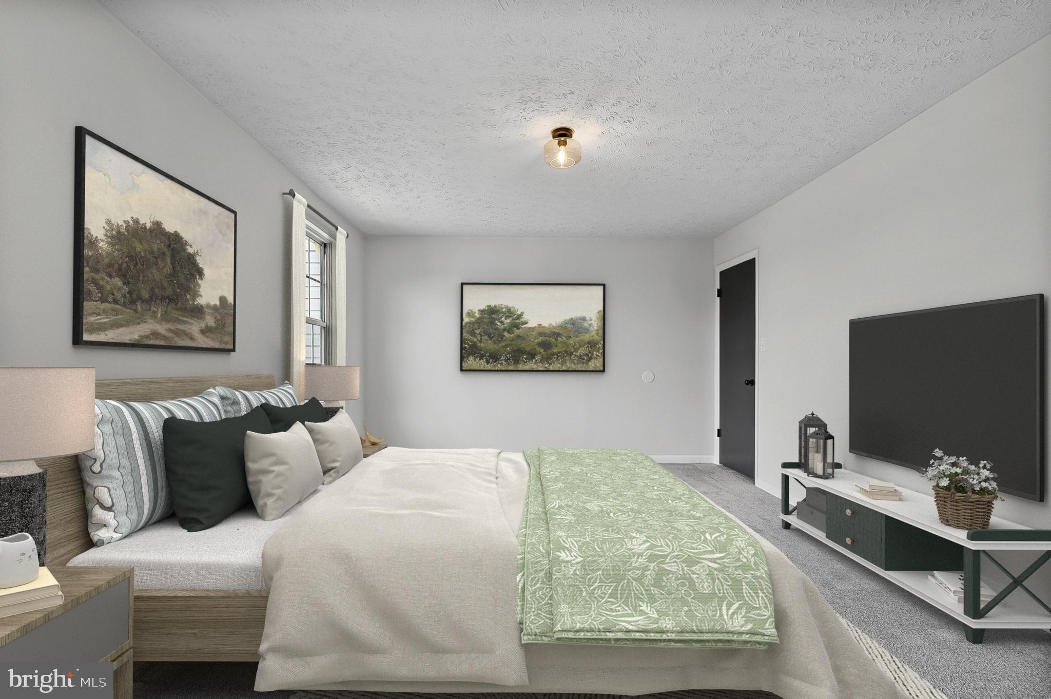 909 Olive Branch Court Edgewood, MD 21040 - Photo 17 of 36 a bedroom with a bed and a flat screen tv