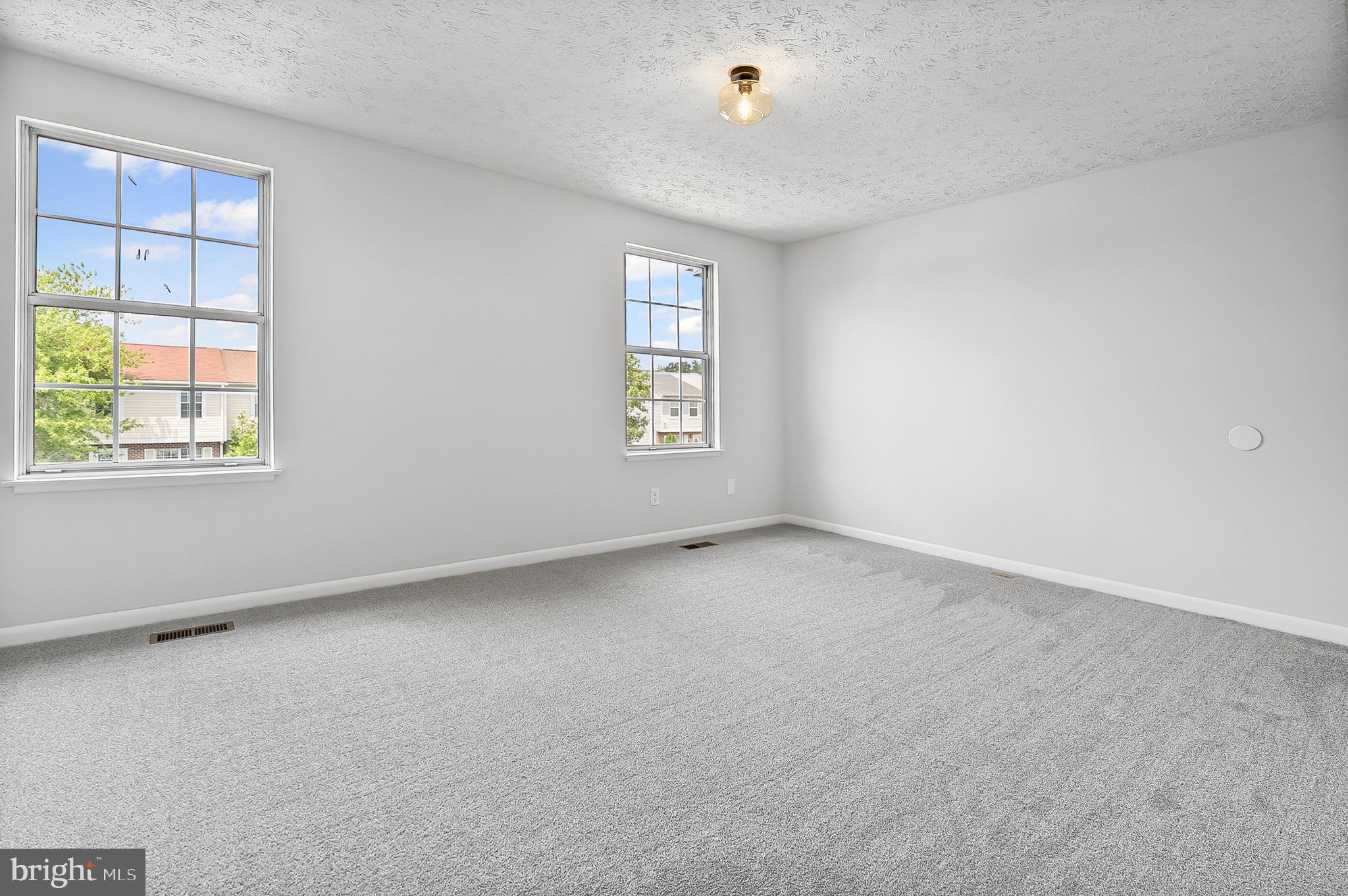 909 Olive Branch Court Edgewood, MD 21040 - Photo 19 of 36 an empty room with windows