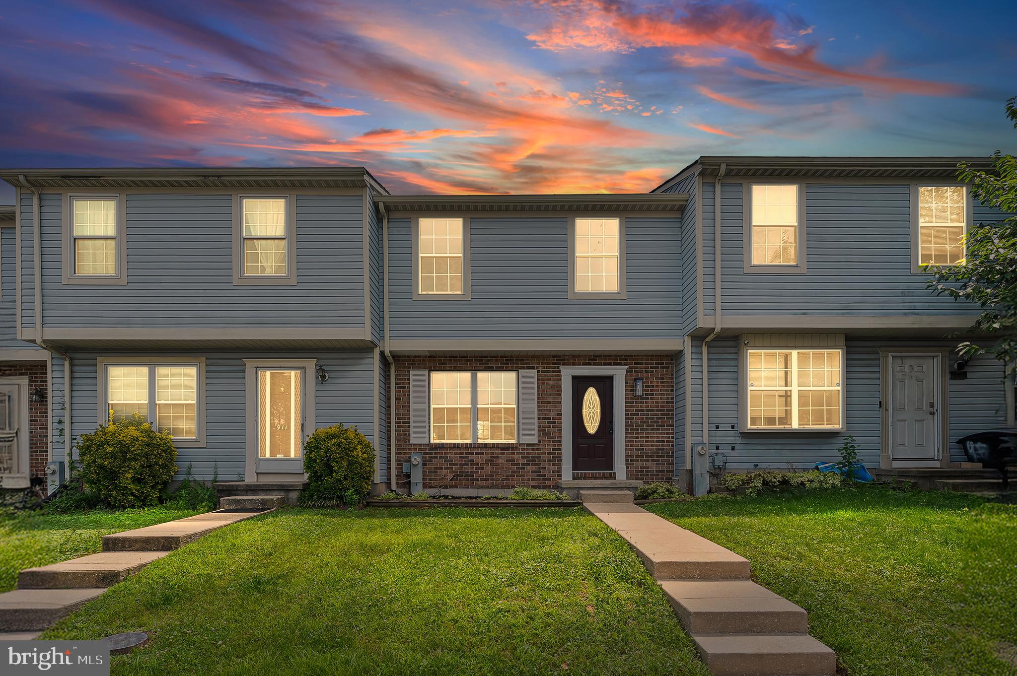909 Olive Branch Court Edgewood, MD 21040 - Photo 2 of 36 a front view of a house with a yard