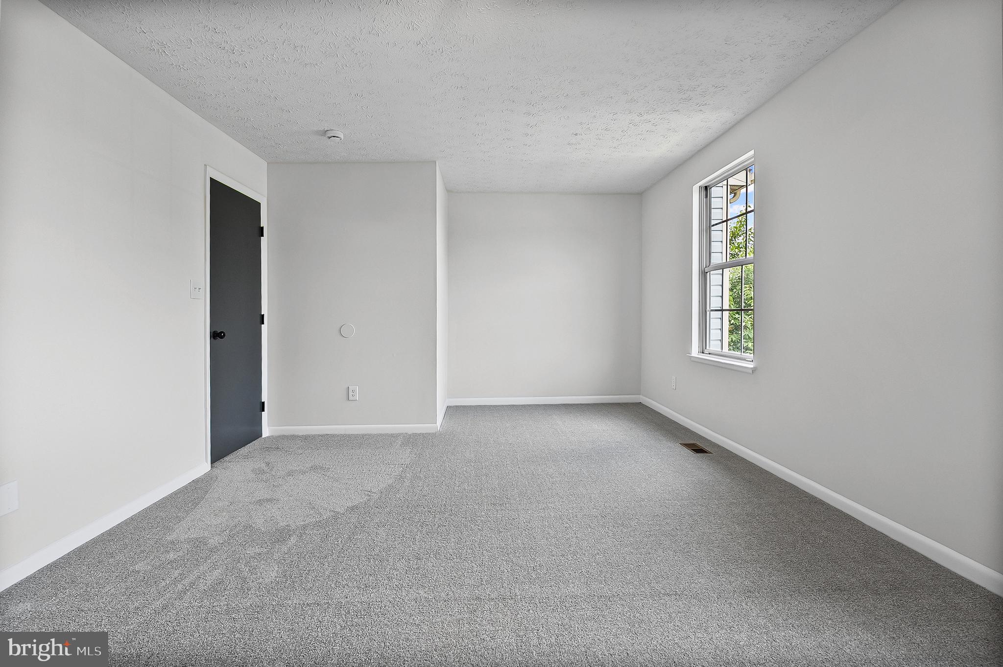 909 Olive Branch Court Edgewood, MD 21040 - Photo 21 of 36 an empty room with windows and closet