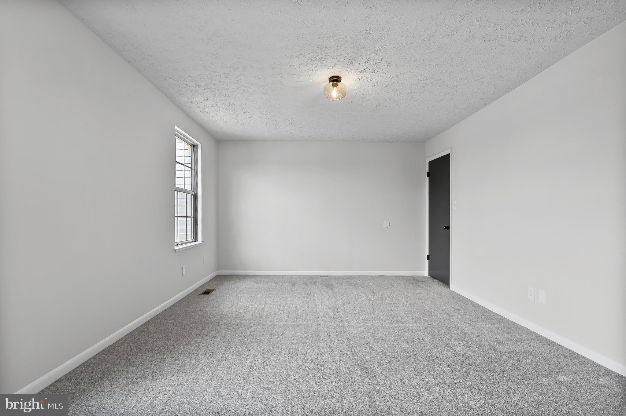 909 Olive Branch Court Edgewood, MD 21040 - Photo 23 of 36 an empty room with windows
