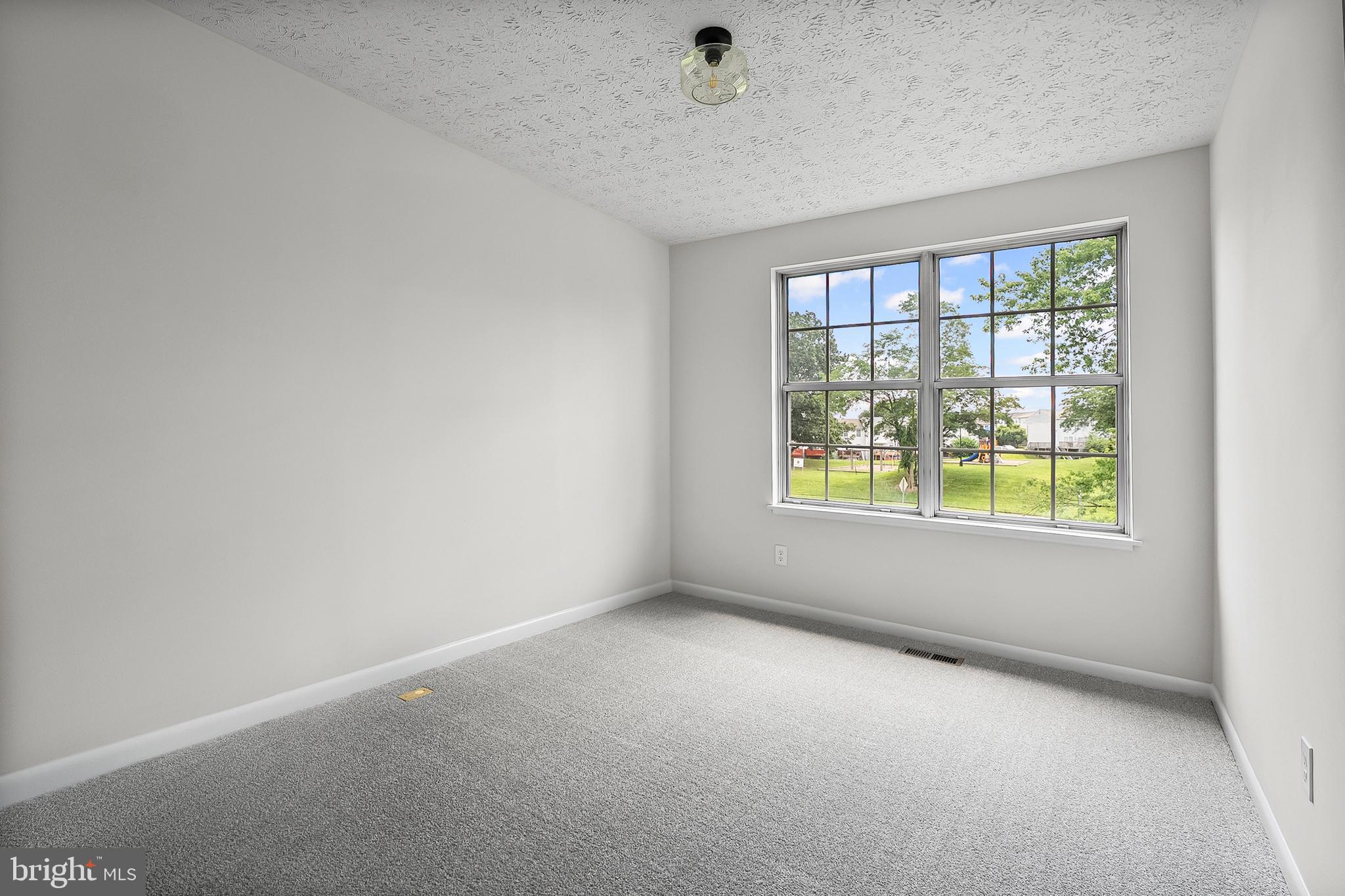 909 Olive Branch Court Edgewood, MD 21040 - Photo 25 of 36 an empty room with a window