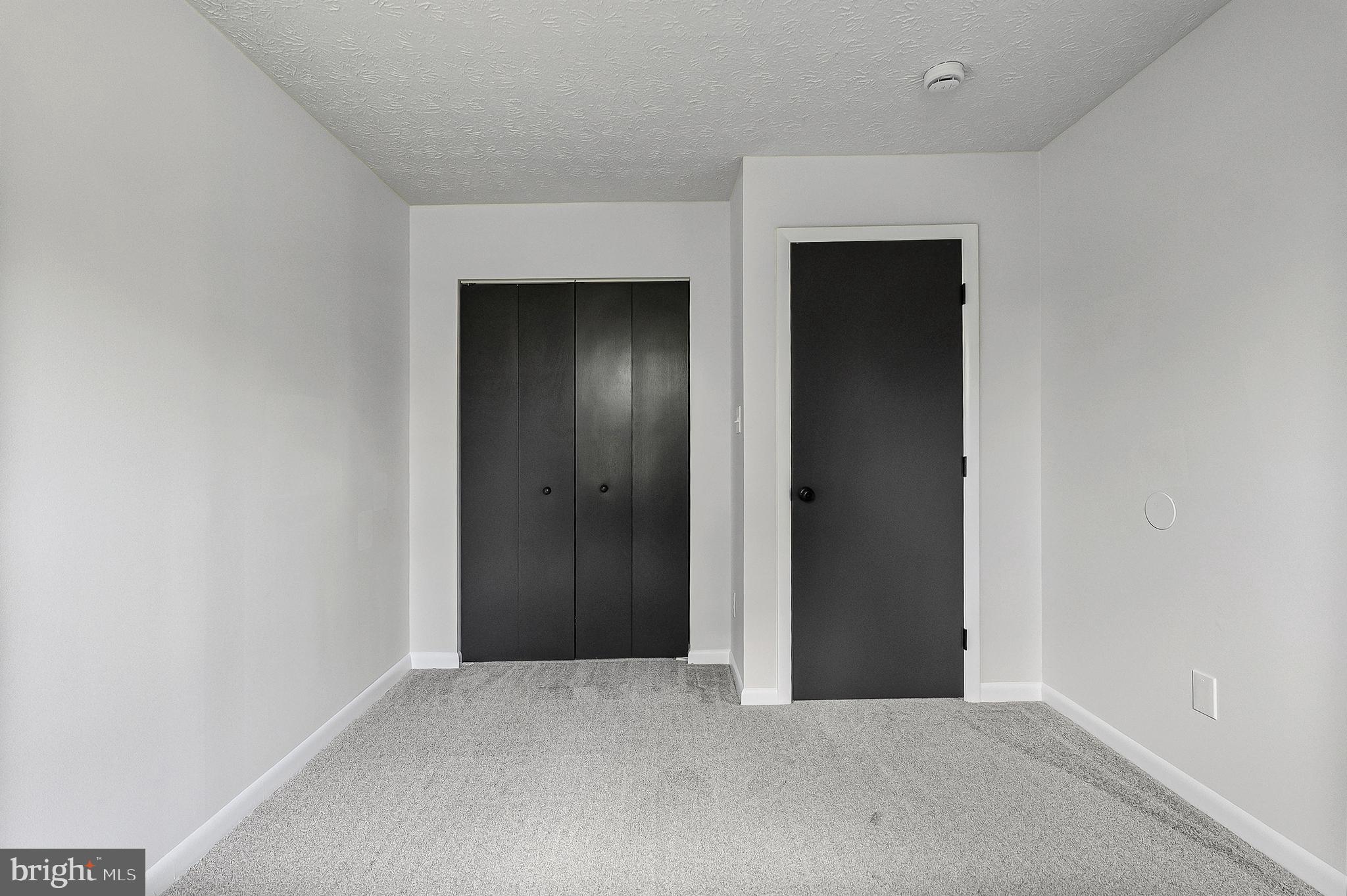 909 Olive Branch Court Edgewood, MD 21040 - Photo 26 of 36 an empty room with closet