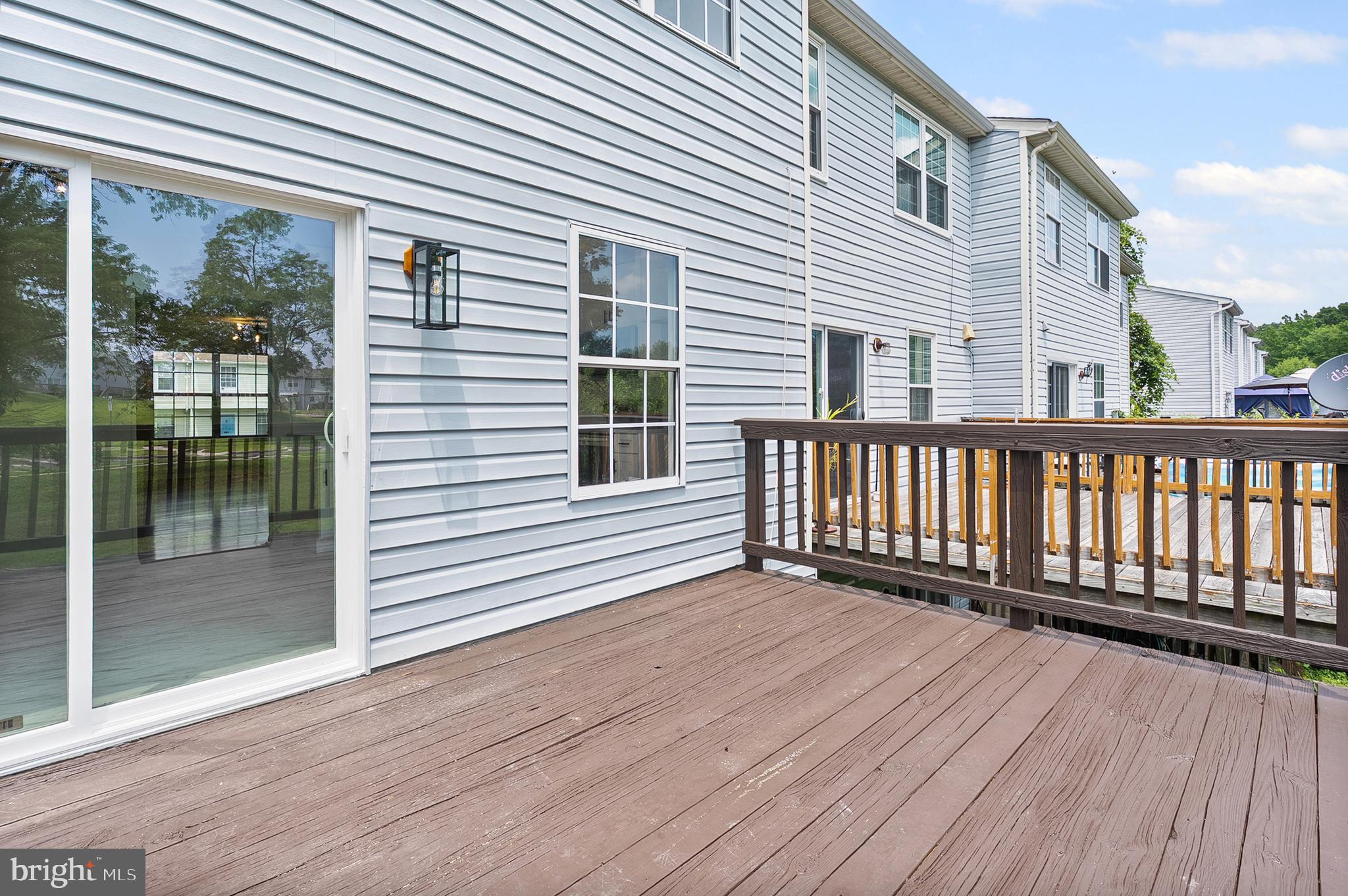 909 Olive Branch Court Edgewood, MD 21040 - Photo 32 of 36 a view of a wooden deck