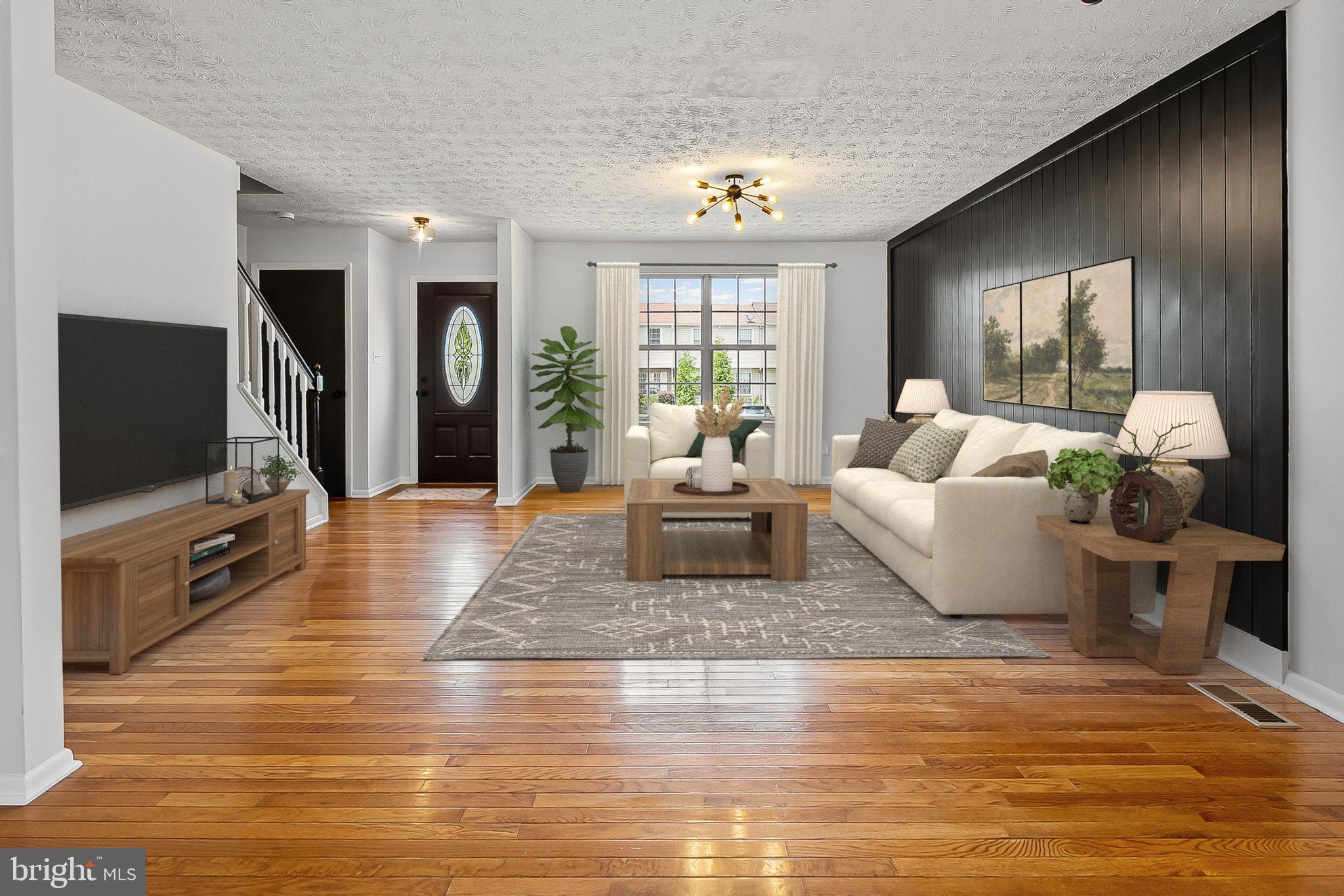 909 Olive Branch Court Edgewood, MD 21040 - Photo 4 of 36 a living room with furniture and a flat screen tv