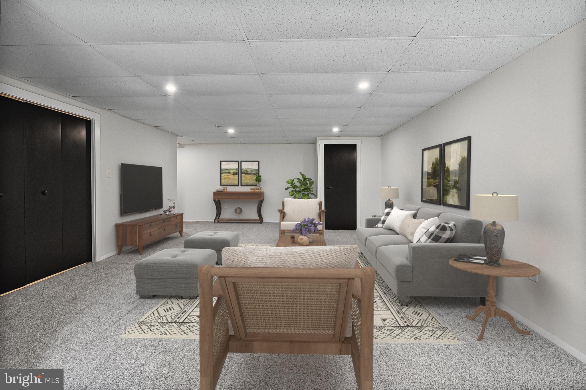 909 Olive Branch Court Edgewood, MD 21040 - Photo 5 of 36 a living room with furniture and a flat screen tv