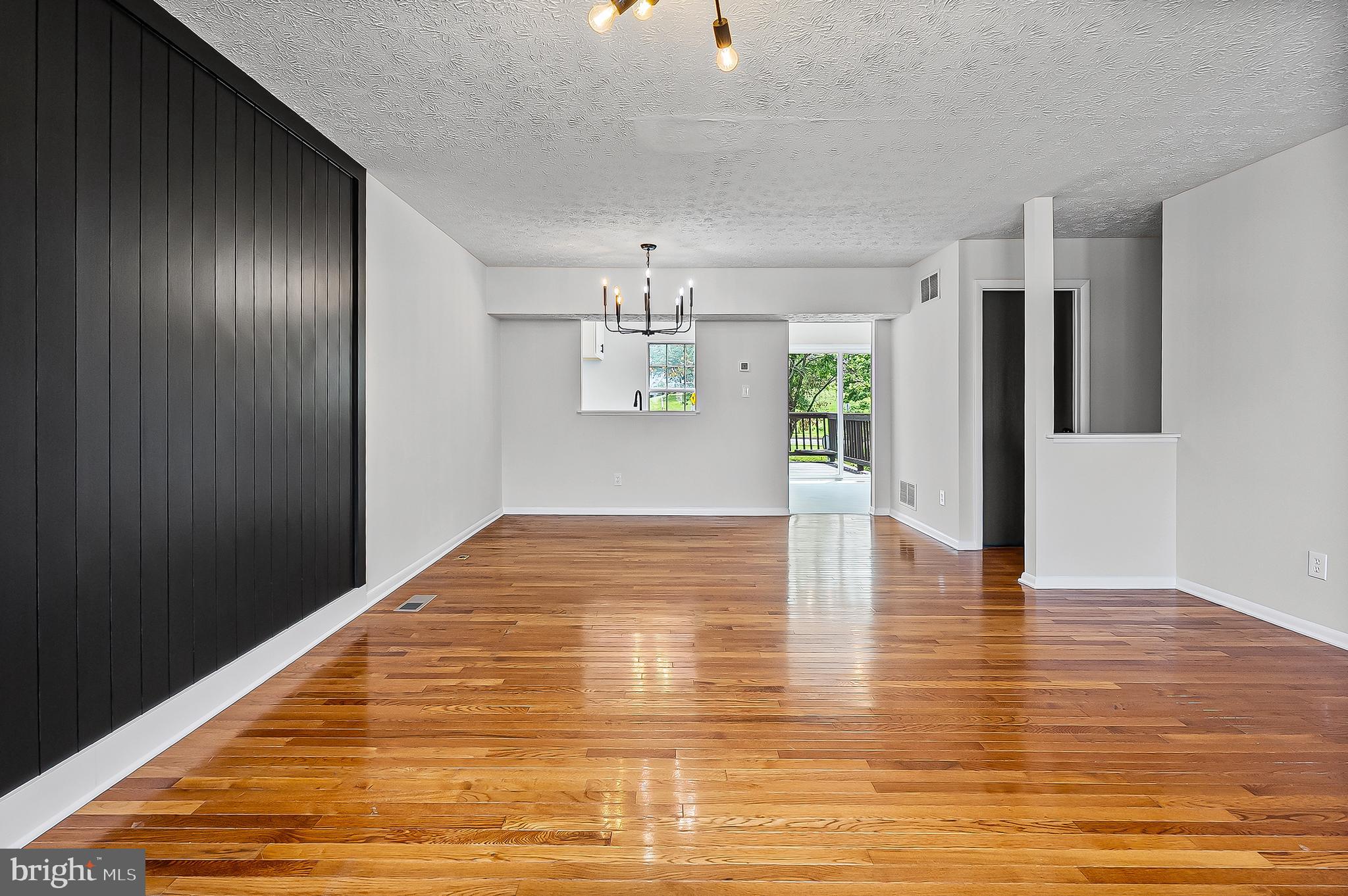 909 Olive Branch Court Edgewood, MD 21040 - Photo 7 of 36 a view of empty room with wooden floor